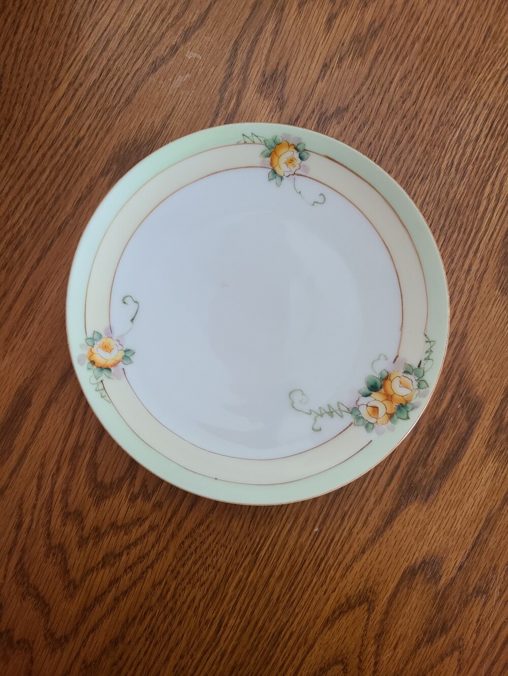 Vintage Meito China bread and butter plate, featuring hand-painted yellow roses
